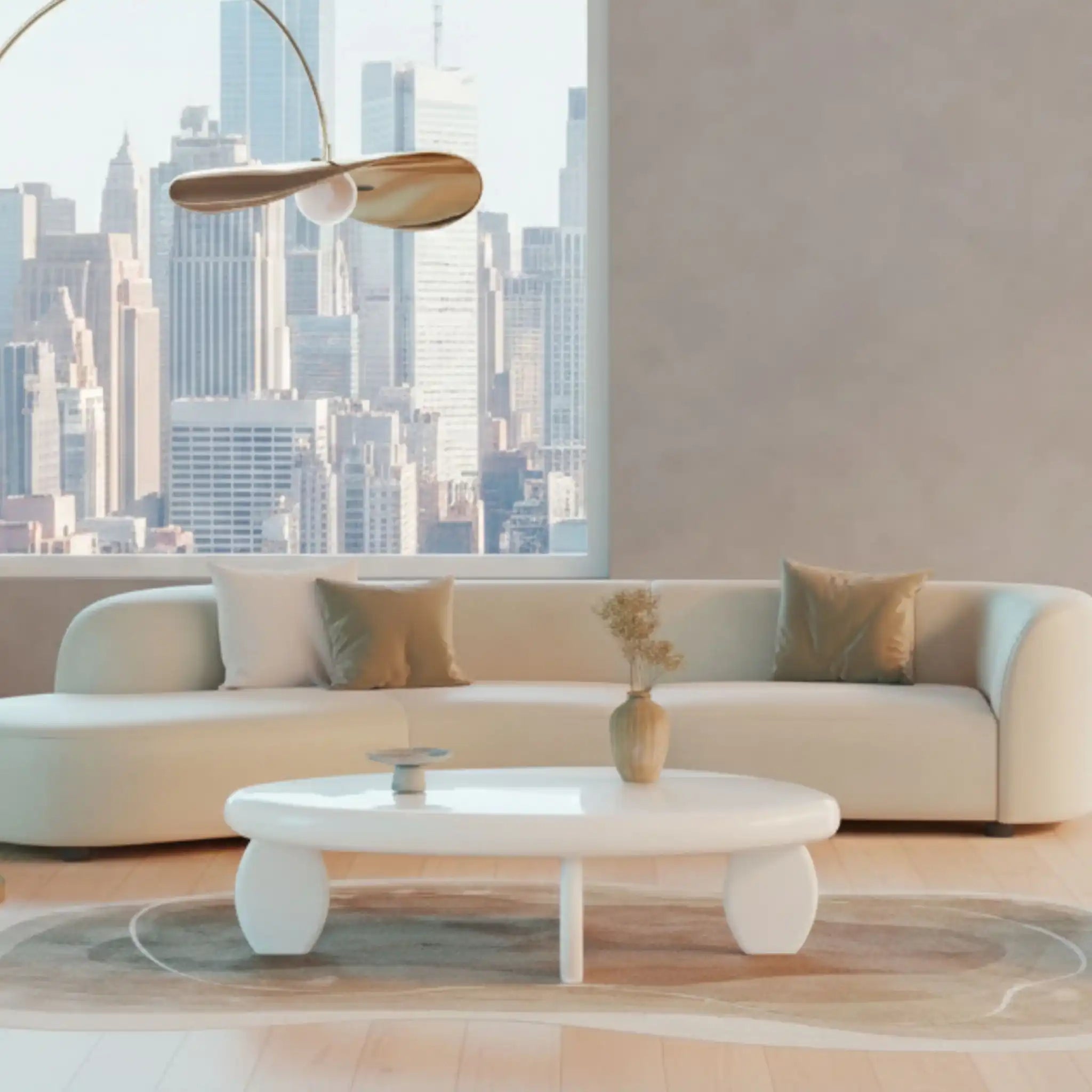 curved fabric sofa in large room with city view