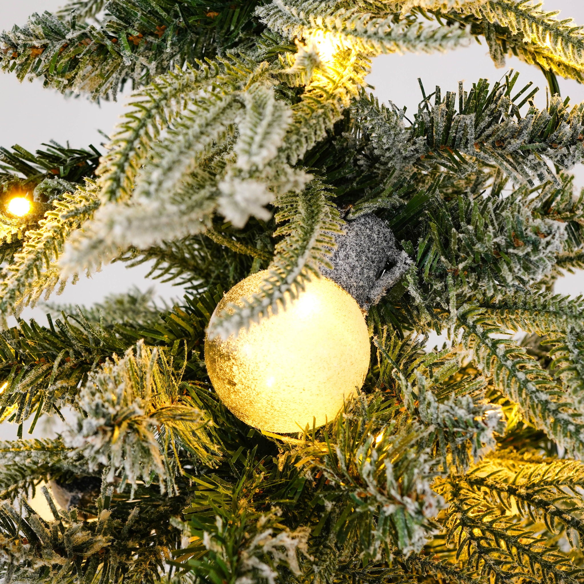 Snow Flocked Christmas Tree With LED Lights