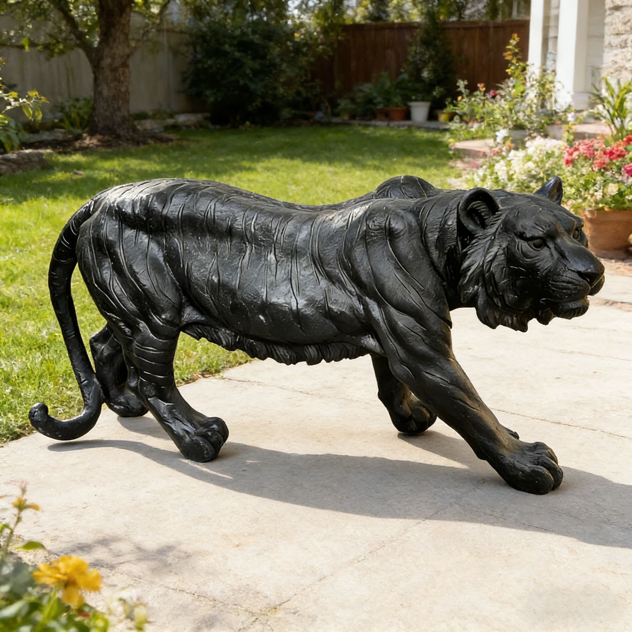 15.75' H x 33.46' L x 7.87' W Simulated Black Tiger Resin Garden Statue