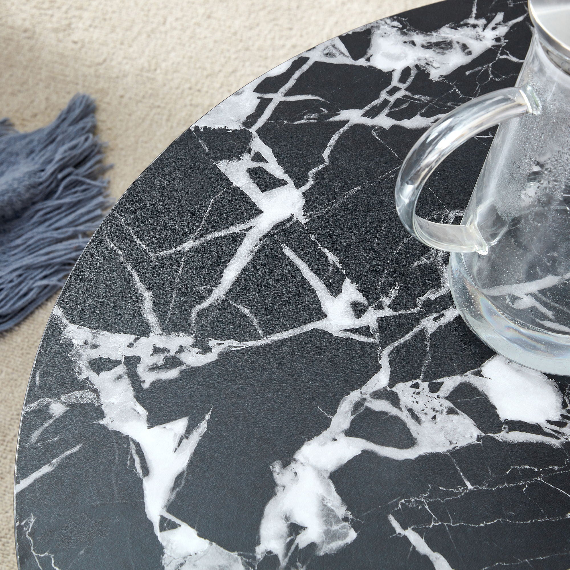 Versatile Round Coffee Table For Various Interior Styles