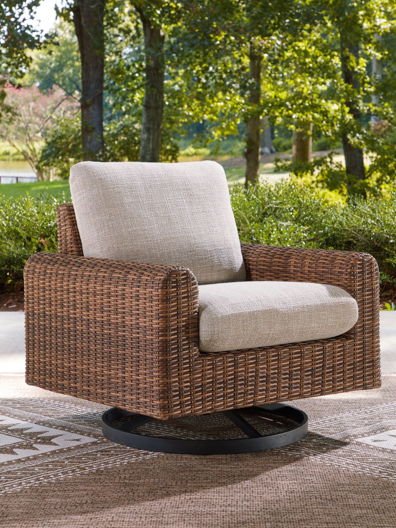 Dolan Creek - Swivel Lounge With Cushion - Gray / Brown
