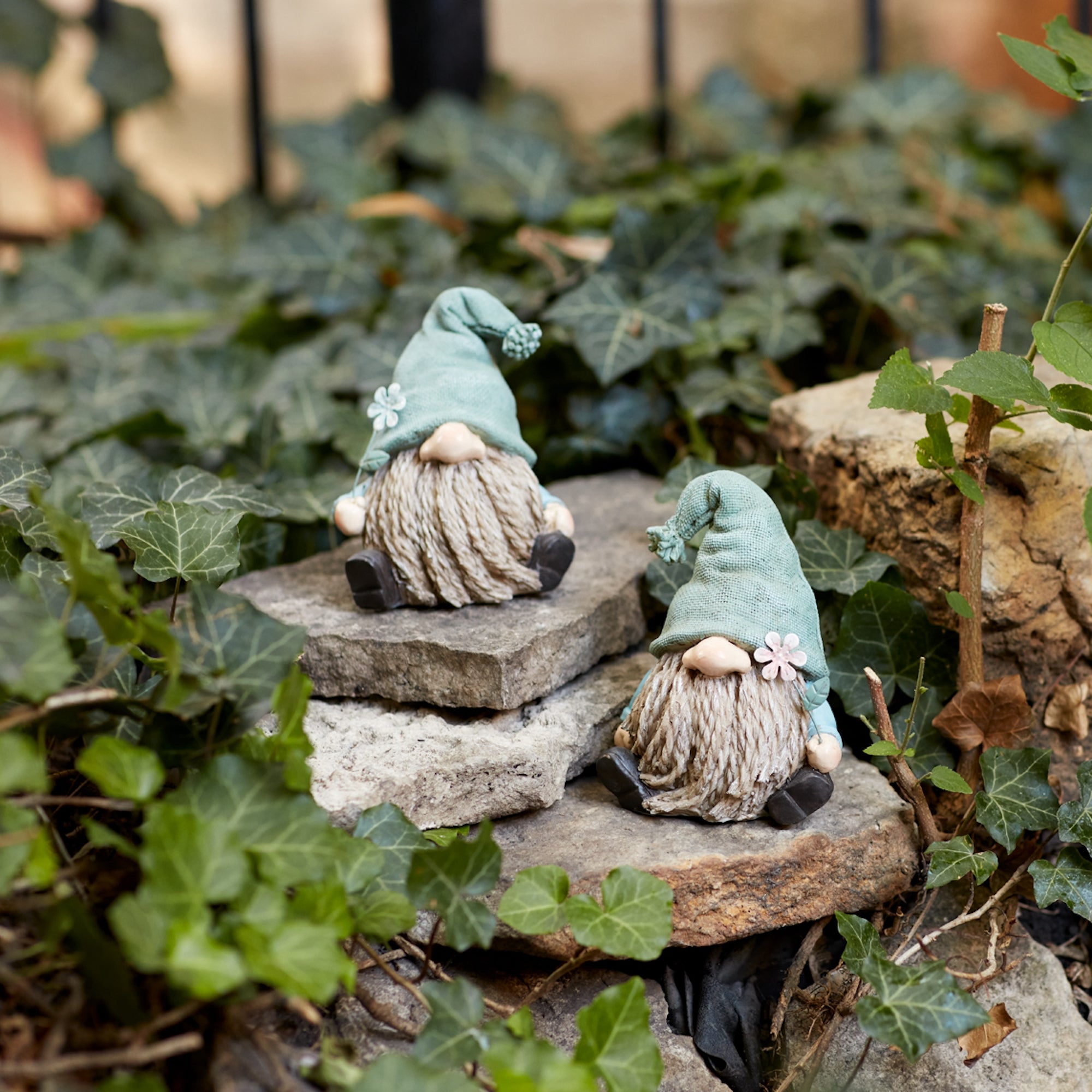 Stone-garden-gnome-figurine-with-flower-stem-accent-(set-of-4)-Artificial-Flowering-Plants