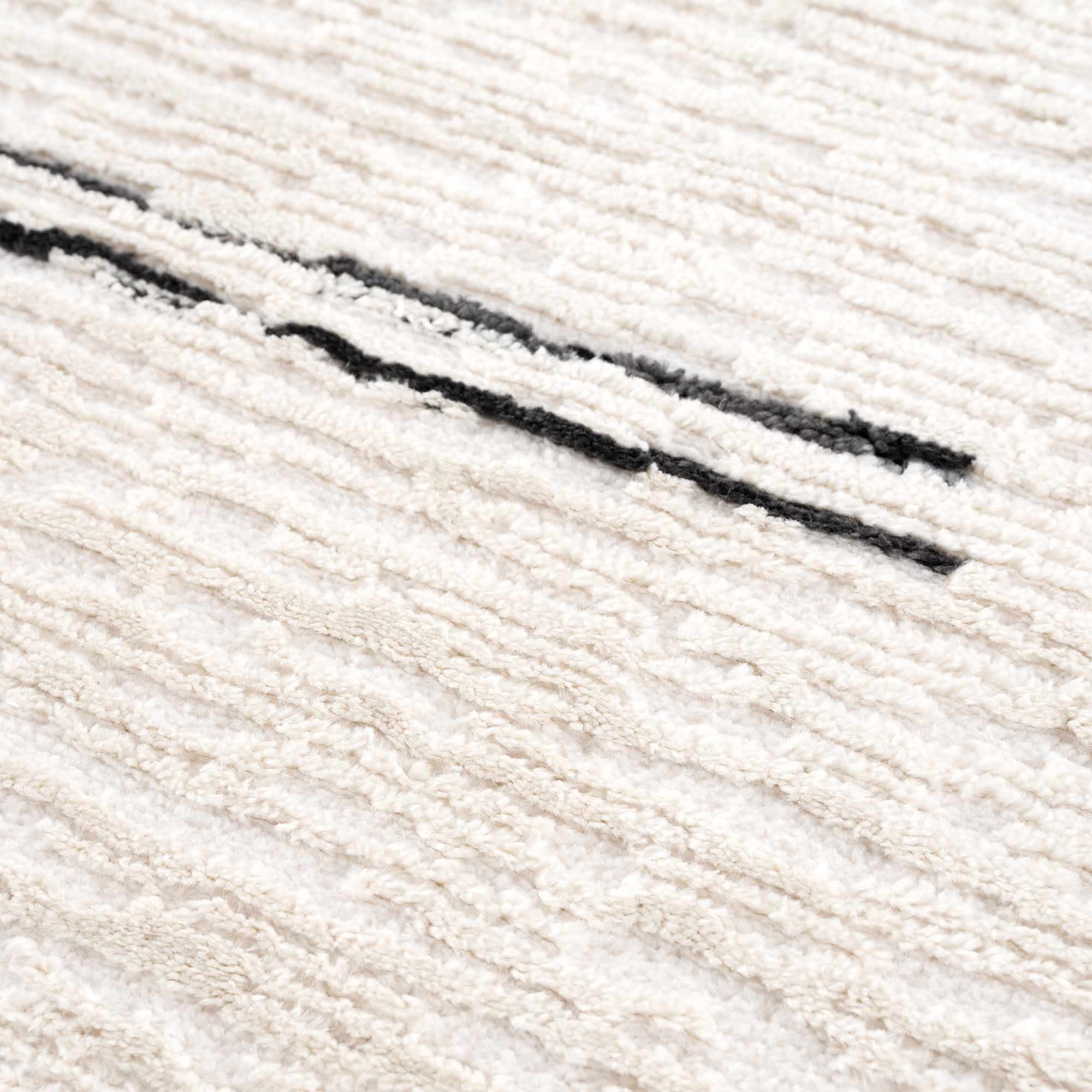 Riad Black Striped White Rug with Tassels