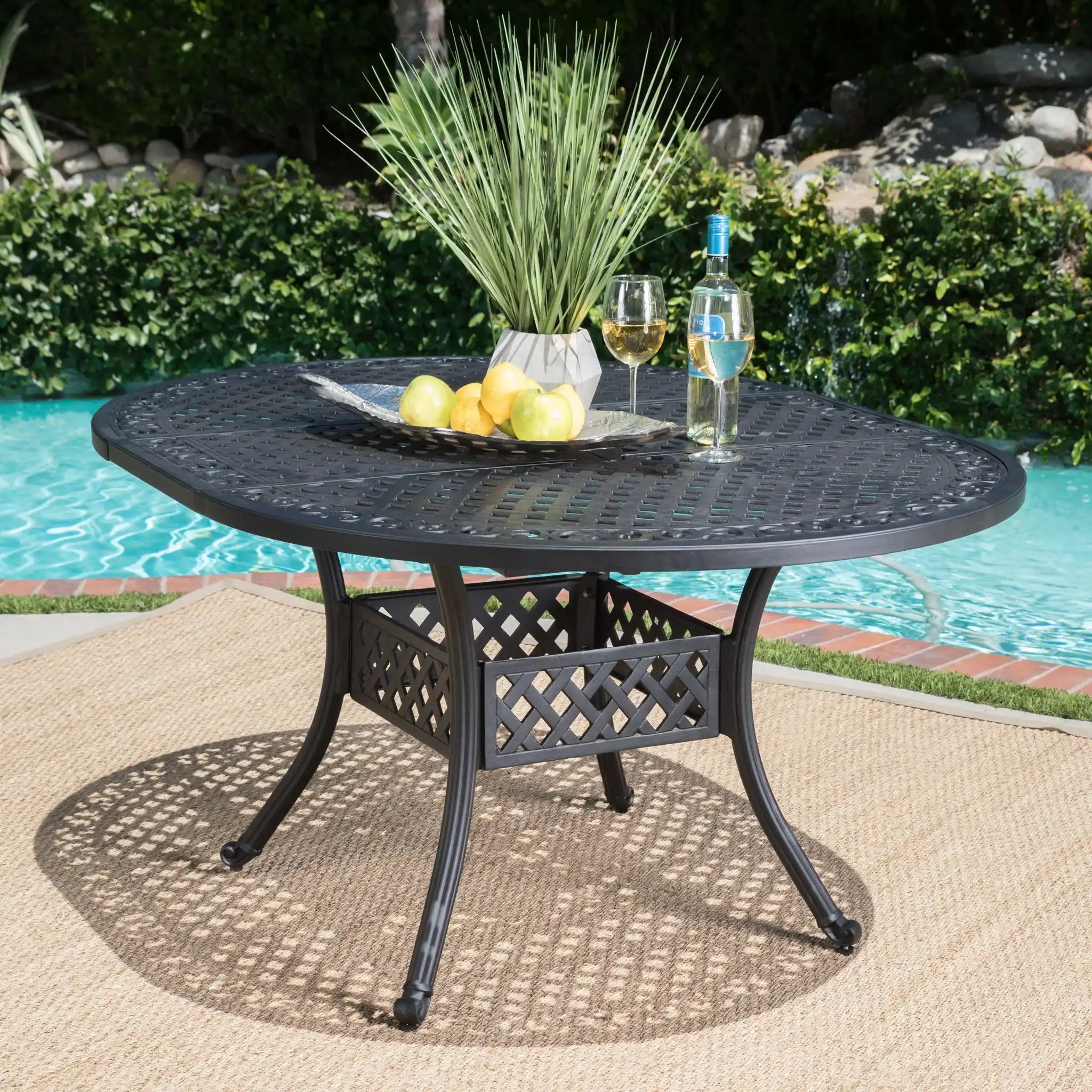 Outdoor Expandable Aluminum Dining Table With Latticework Details And Curvy Legs
