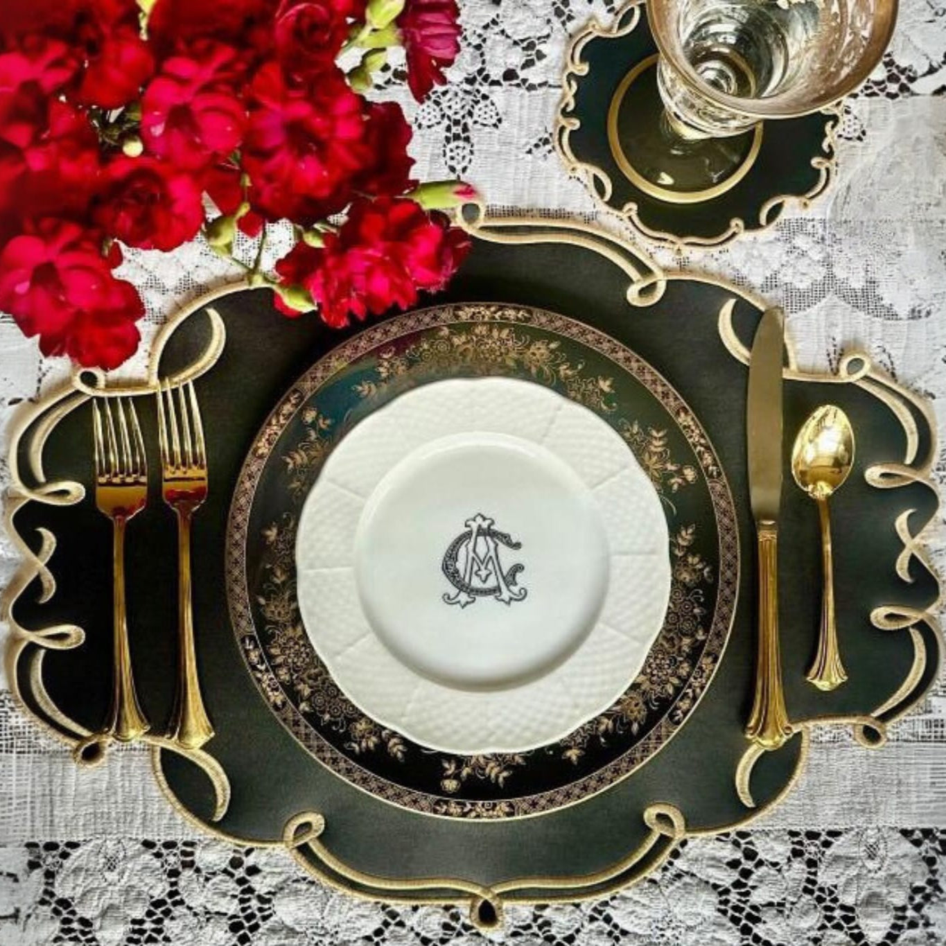 CELESTIA BLACK OVAL FAUX LEATHER PLACEMAT & NAPKIN & COASTER SET