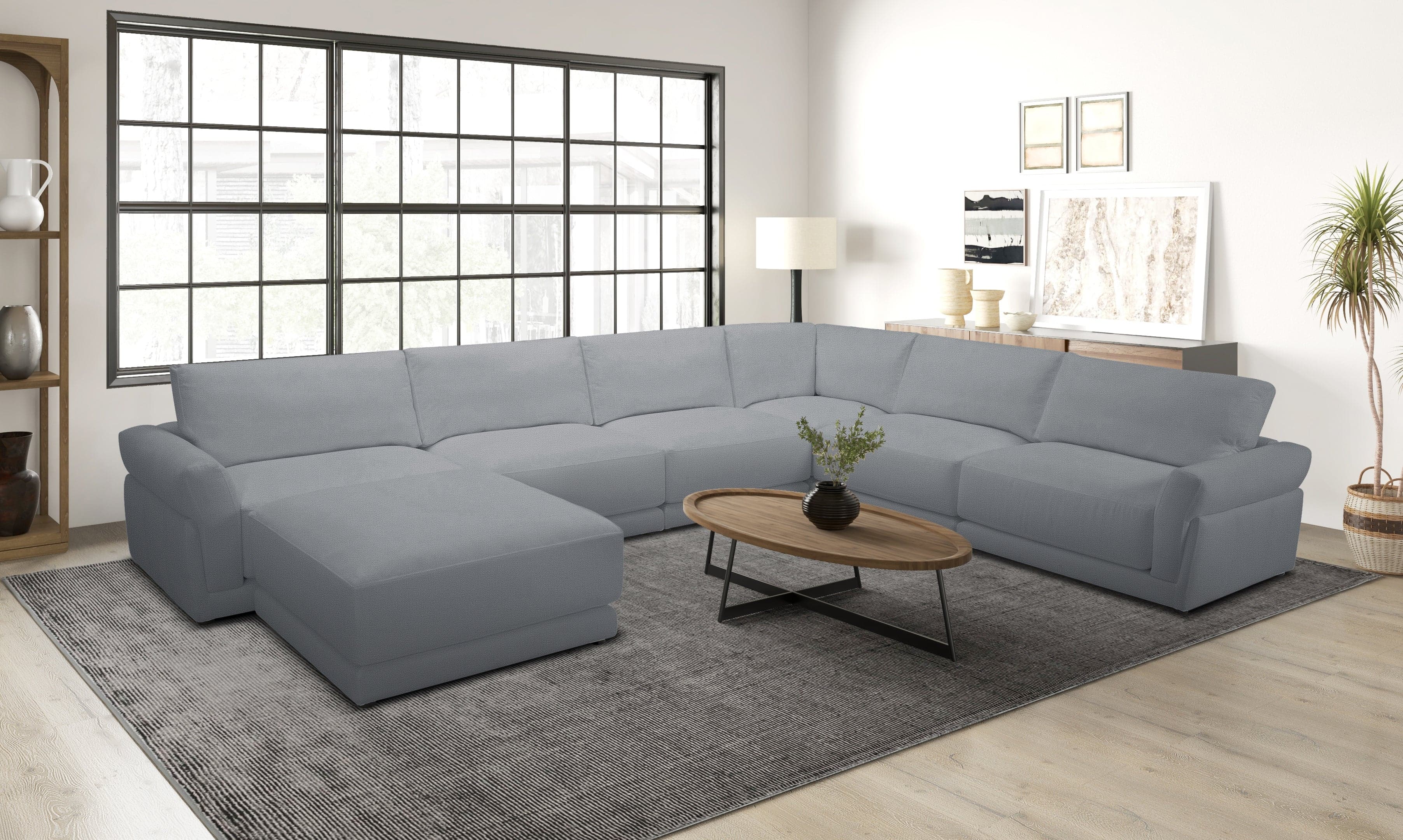 The Brent Cloud Sectional Sofa showcasing its modern aesthetics with clean lines and a sleek design, perfect for contemporary homes.