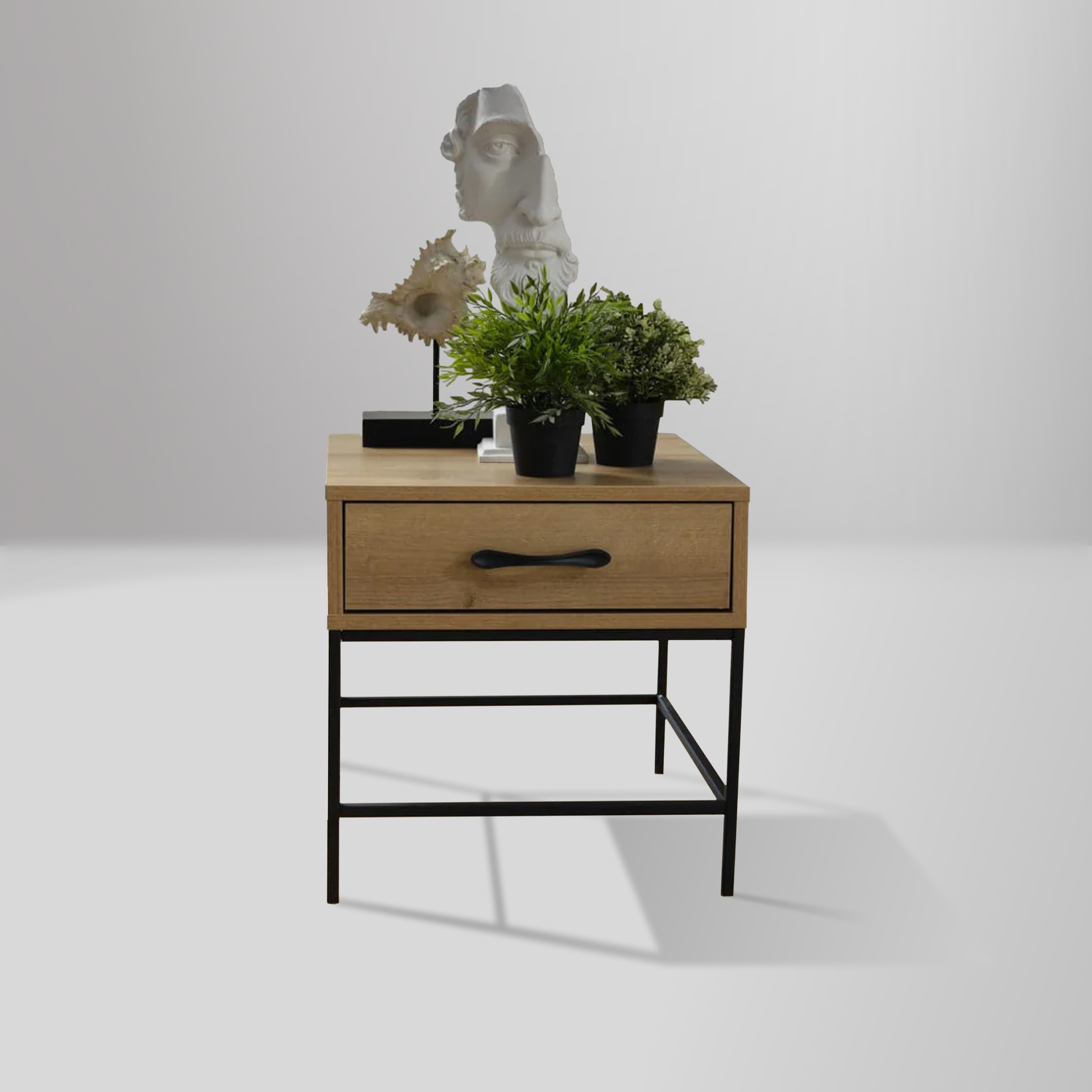 Drift Side Table with light wood finish, black metal hardware, and a spacious drawer for modern storage solutions.