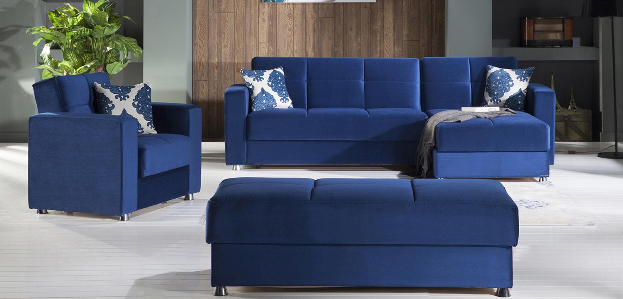 Elegant Sectional transformed into a queen-sized sleeper with ottoman attached.