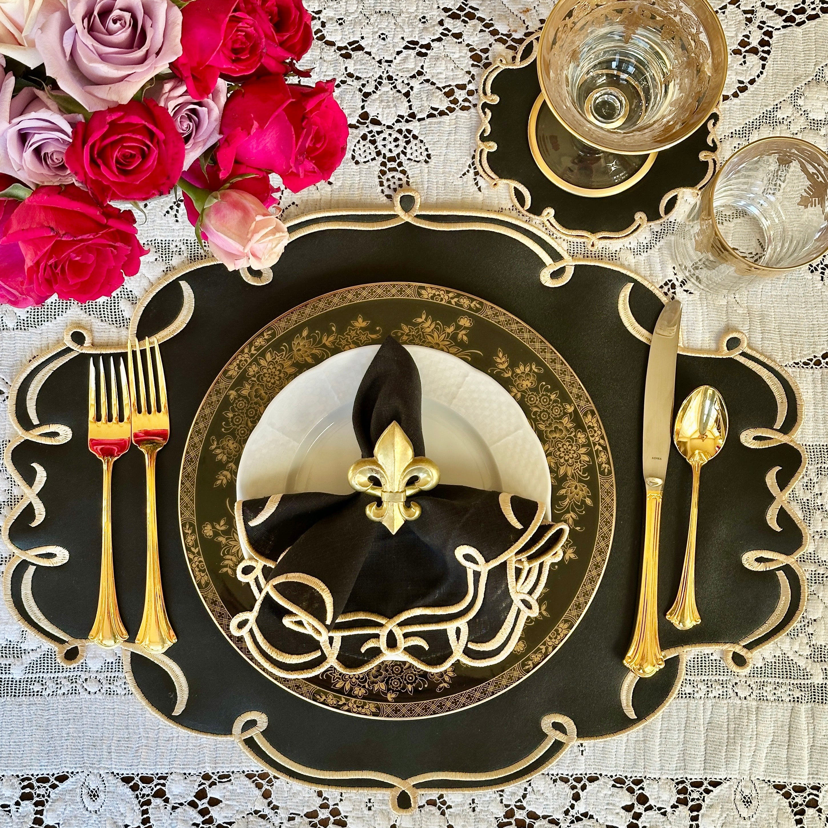 CELESTIA BLACK OVAL FAUX LEATHER PLACEMAT & NAPKIN & COASTER SET