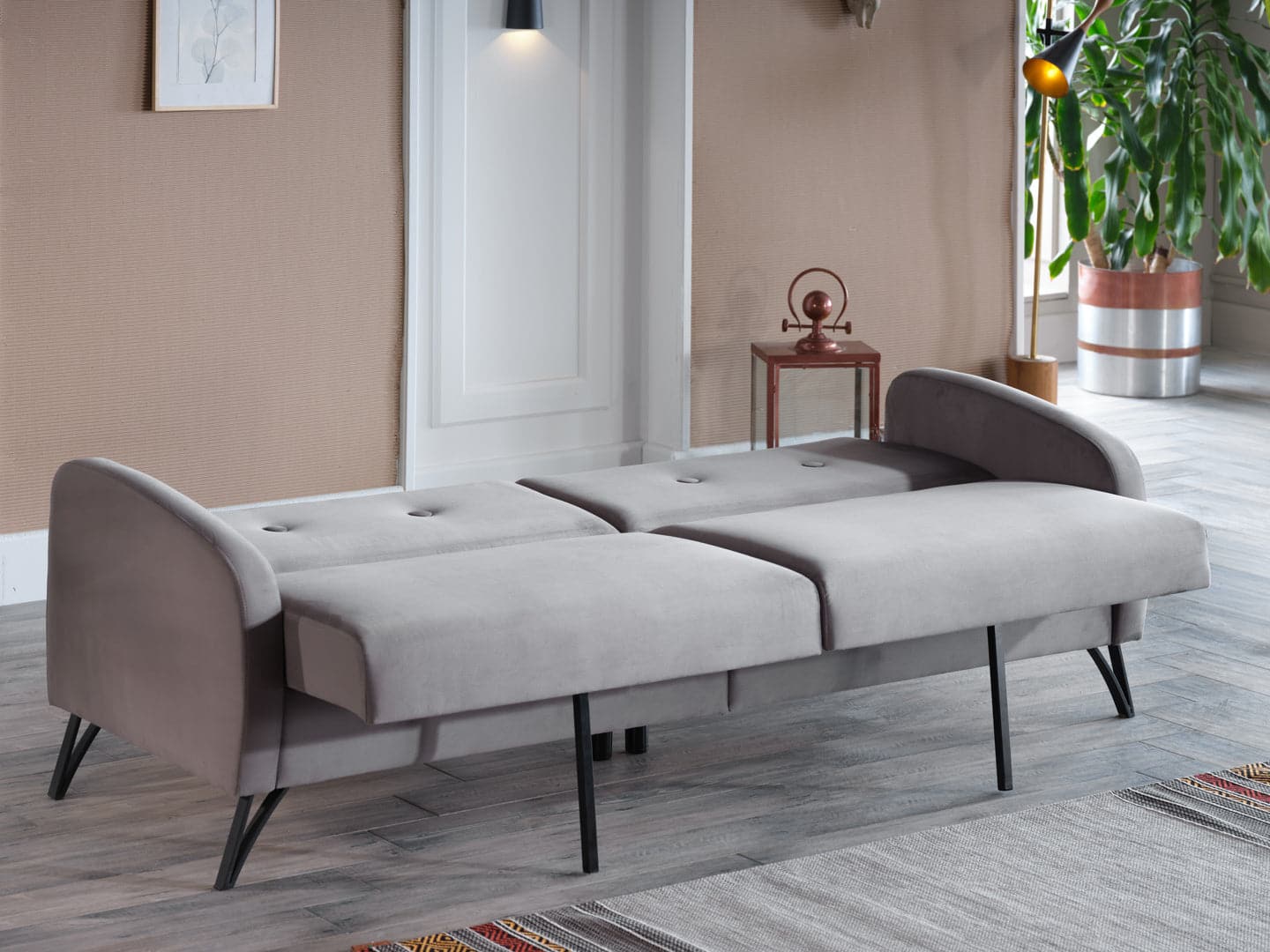 Cozy Juniper Sofa that converts into a comfortable sleeper, perfect for overnight guests.