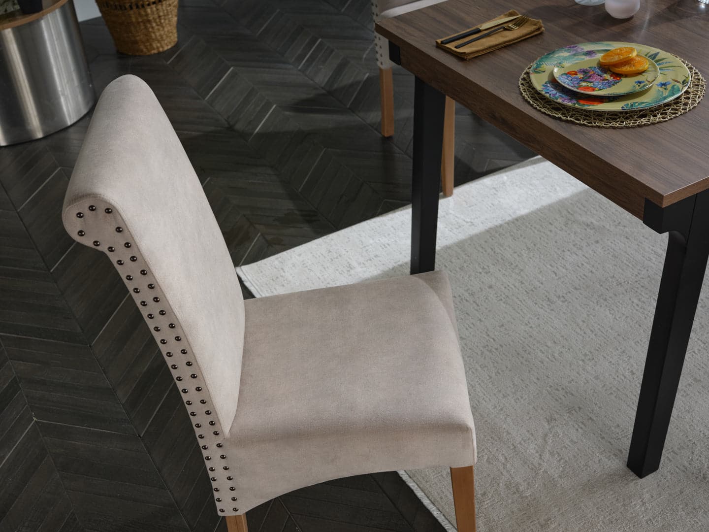 Margo Dining Chair upholstered in performance fabric, ideal for enduring family dinners and gatherings.