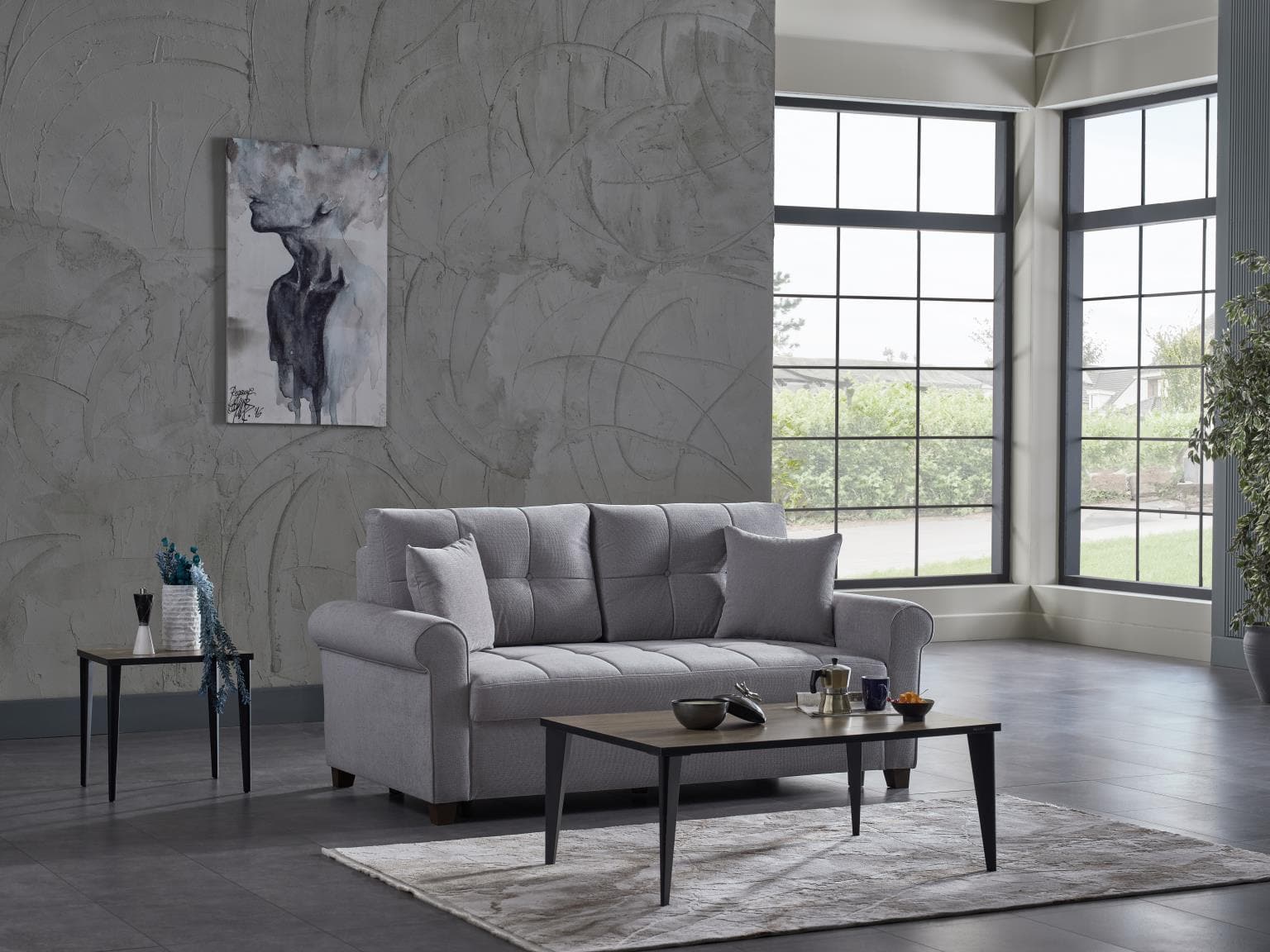 Mocca P Arm Sofa in Koopsi Gray with accent pillows.