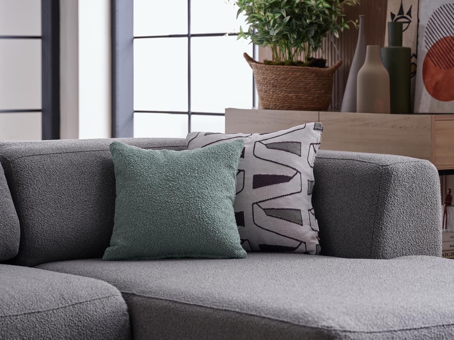 Easy-to-transform Picasso Sleeper Sectional with sleek lines and plush fabric. Perfect for modern living spaces.