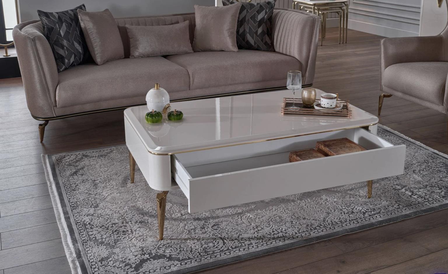 Plaza Coffee Table styled with books and plants in cozy living room setting