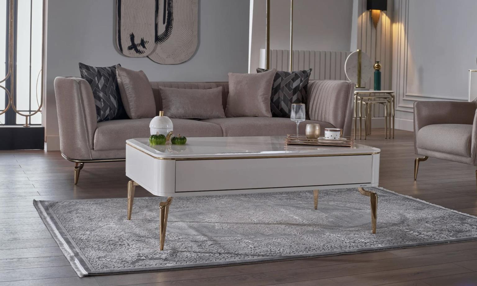 Close-up of Plaza Coffee Table's sturdy surface holding coffee mugs and decor