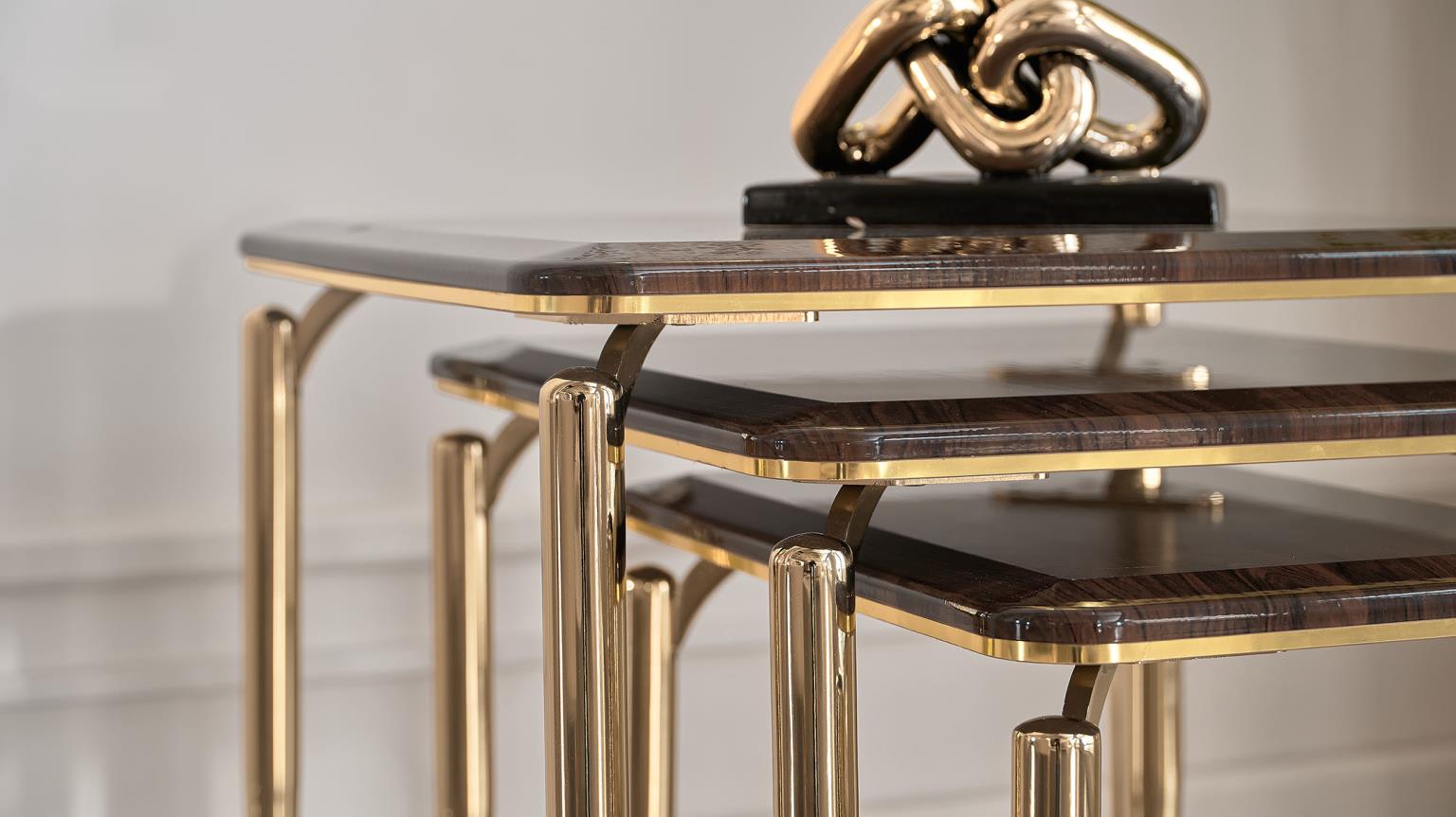 The Plaza Nesting Table offers space-saving functionality with its compact design. Ideal for small spaces, this modern wood table set combines style and durability.