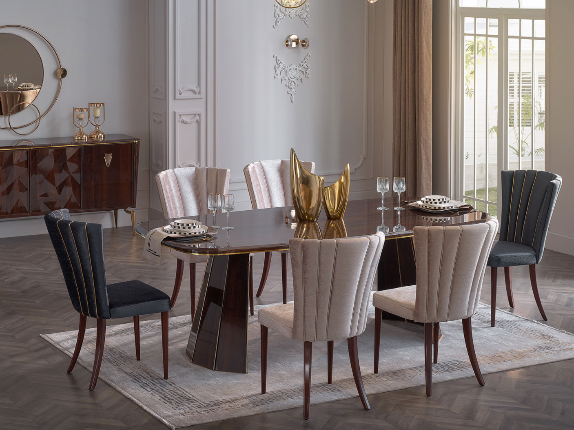 Elegant Plaza walnut dining table set with gold-accented tableware and glassware.