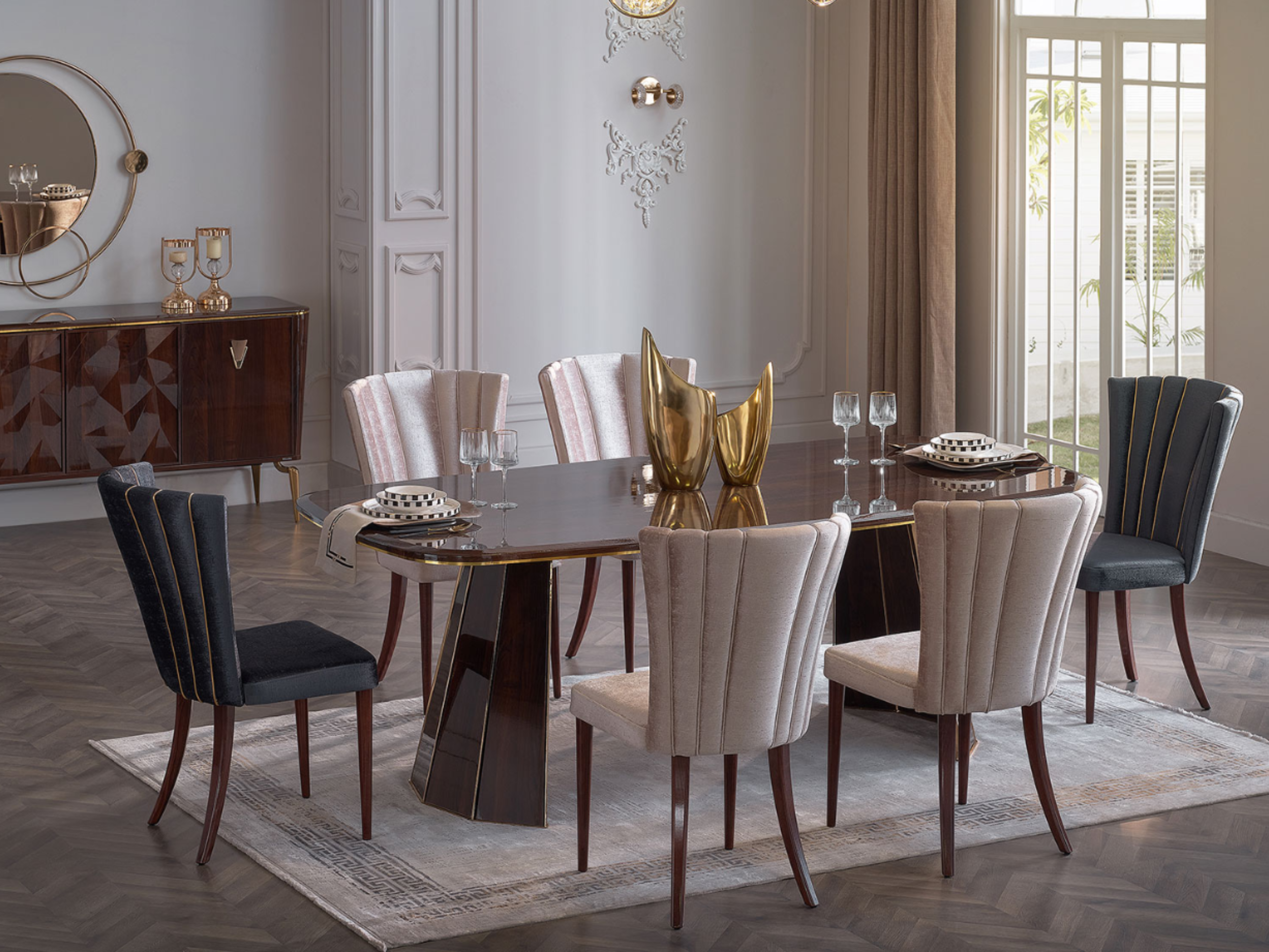 Elegant Plaza walnut dining table set with gold-accented tableware and glassware.