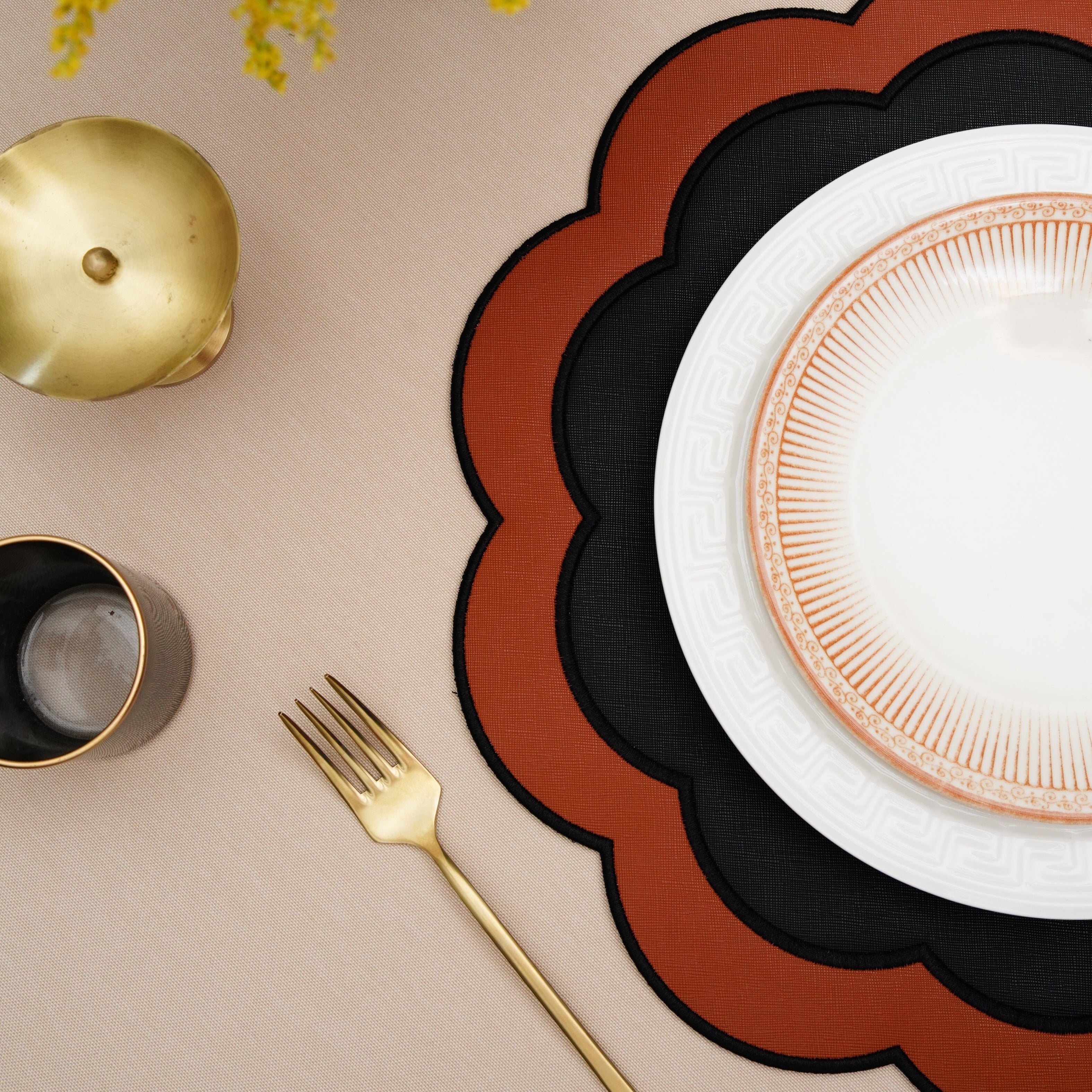 SERENITY BLACK ORANGE SCLALOPED FAUX LEATHER PLACEMAT