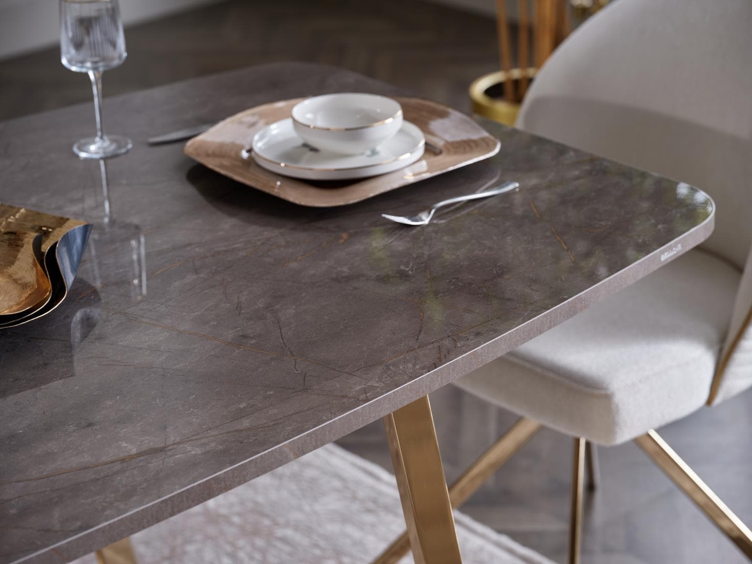 Complete Veronica Dining Room Set featuring a modern table, buffet, chairs, and mirror with opulent gold details