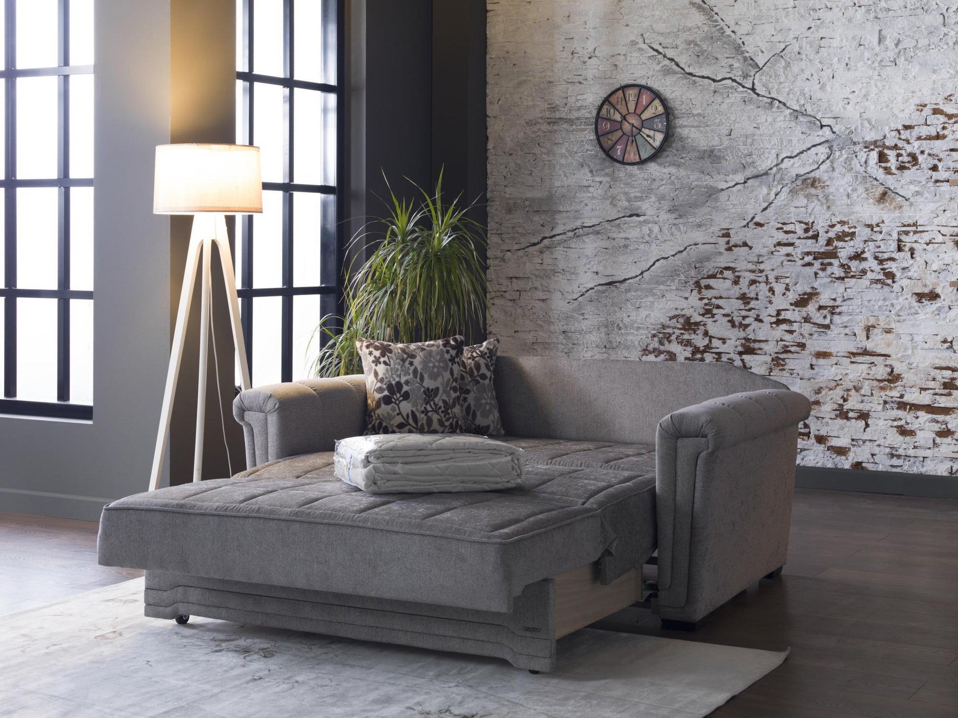 Victoria loveseat featuring a solid wood frame and metal feet