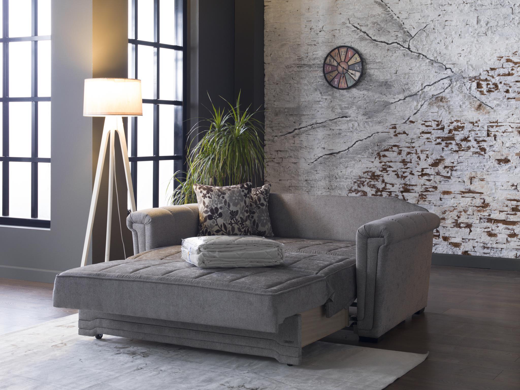 Victoria loveseat featuring a solid wood frame and metal feet